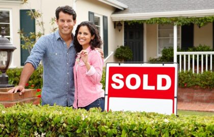 Image of a couple standing outside their sold Parkside property