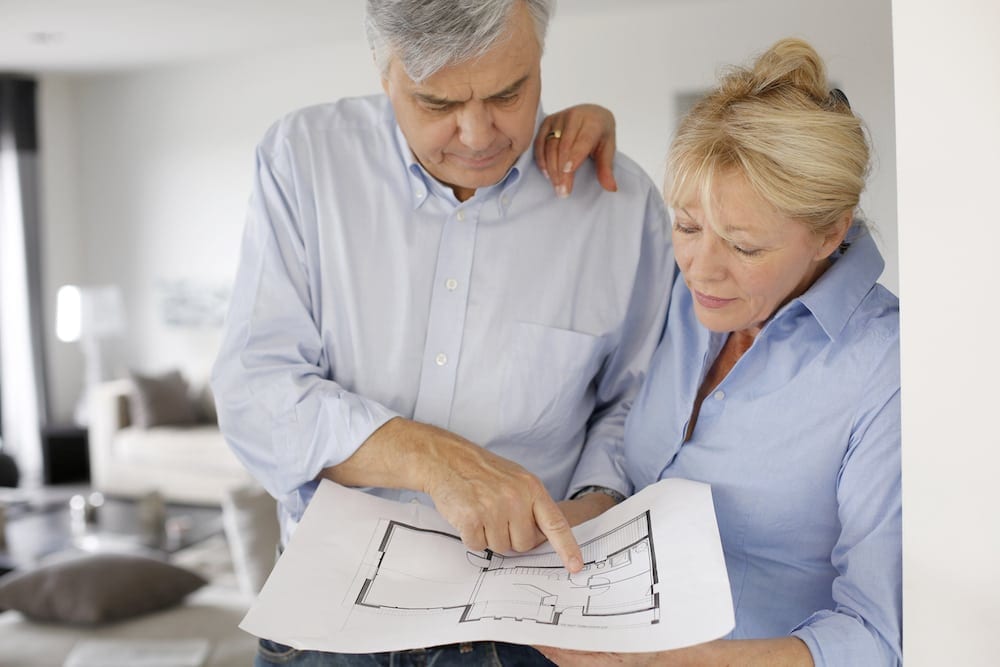 Image of a couple discussing building plans