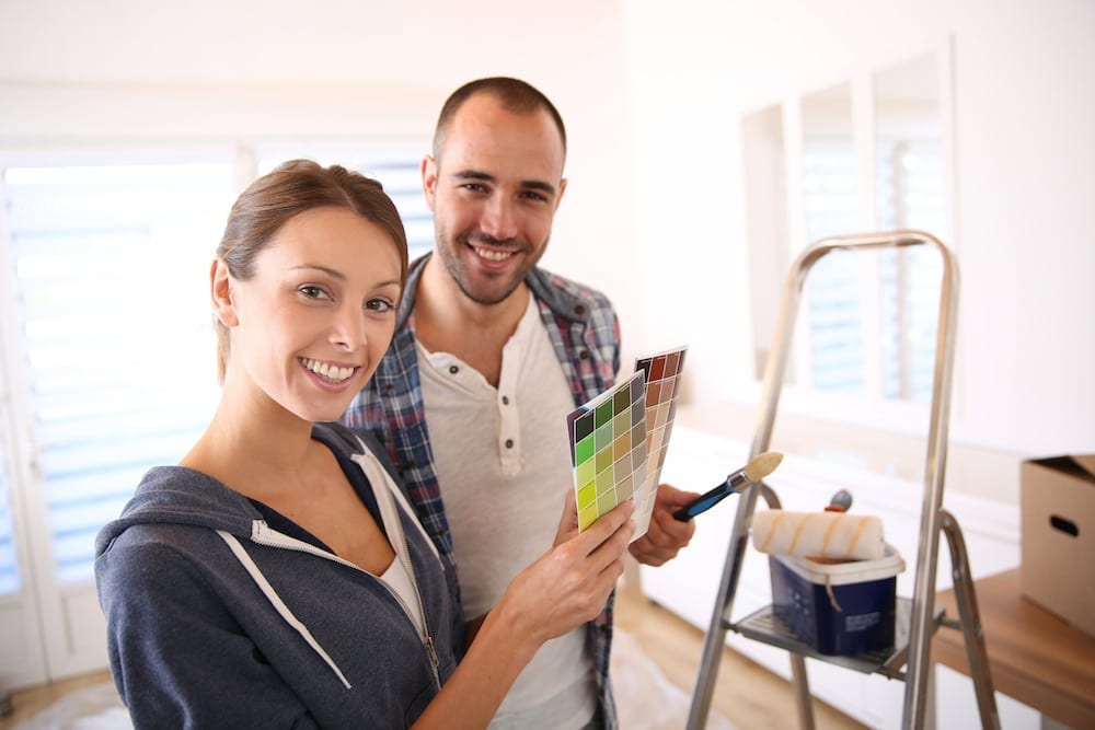 Image of a couple painting