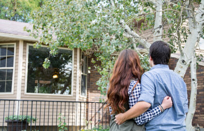 Couple looking at exterior of Sydney house